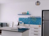 1 yatak odalı Denize sıfır yeni tatil dairesi + ortak yüzme havuzlu + site içi + Deniz ve Dağ manzarası + plaja yürüme mesafesinde