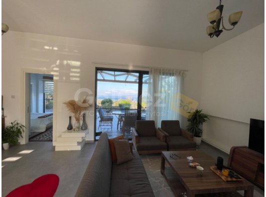 A 3 bedroom bungalow + roof terrace + communal pool + amazing sea views