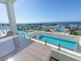 2 yatak odalı lüks penthouse daire + özel çatı terası + ortak yüzme havuzları + restoran + SPA merkezi + tenis kortu + golf