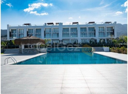 Zemin kattaki ikinci el şık stüdyo daire + tam mobilyalı + sahilde konum + olimpik büyüklükte üçlü yüzme havuzu + bio çiftlik + ısıtmalı kapalı havuz + çok sayı