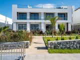 Zemin kattaki ikinci el şık stüdyo daire + tam mobilyalı + sahilde konum + olimpik büyüklükte üçlü yüzme havuzu + bio çiftlik + ısıtmalı kapalı havuz + çok sayı