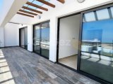 Absolutely amazing super luxurious 2 bedroom penthouse for sale on the exclusive De Ja Blue site in Bahceli with spectacular sea views