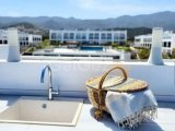 Absolutely amazing super luxurious 2 bedroom penthouse for sale on the exclusive De Ja Blue site in Bahceli with spectacular sea views