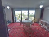 2 yatak odalı bahçeli daire + full eşyalı + depo odası + 3 ortak yüzme havuzu + amfitiyatro + okullara ve Girne şehir merkezine yakınlık