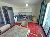 2 yatak odalı bahçeli daire + full eşyalı + depo odası + 3 ortak yüzme havuzu + amfitiyatro + okullara ve Girne şehir merkezine yakınlık