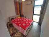 2 yatak odalı bahçeli daire + full eşyalı + depo odası + 3 ortak yüzme havuzu + amfitiyatro + okullara ve Girne şehir merkezine yakınlık
