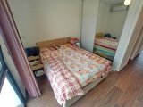 2 yatak odalı bahçeli daire + full eşyalı + depo odası + 3 ortak yüzme havuzu + amfitiyatro + okullara ve Girne şehir merkezine yakınlık