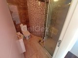 2 yatak odalı bahçeli daire + full eşyalı + depo odası + 3 ortak yüzme havuzu + amfitiyatro + okullara ve Girne şehir merkezine yakınlık