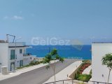 REDUCED - Amazingly beautiful brand new 3+1 apartment within feet away from the breathtaking sea in Esentepe for sale or rental