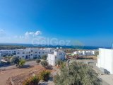 Well Presented 2 Bedroom Town House + Shared Pool + Amazing Panoramic Sea Views In The Esentepe Region Near To The Korineum Golf Club