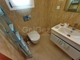 2 yatak odalı zemin kat daire + full eşyalı + ortak havuzlar + restoran + SPA merkezi + süpermarket + eczane + plaja yürüme mesafesinde