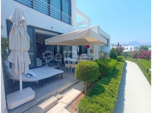 3 yatak odalı bahçe katı daire + tamamen mobilyalı + ortak havuzlar + spor salonu + sauna + yepyeni wellness merkezi + denize muhteşem manzaralı + Sahibinin adı