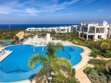 2 yatak odalı bahçe daire + tamamen mobilyalı + ortak havuzlar + spor salonu + sauna + yepyeni wellness merkezi + denize muhteşem manzaralar