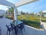 2 yatak odalı bahçe daire + tamamen mobilyalı + ortak havuzlar + spor salonu + sauna + yepyeni wellness merkezi + denize muhteşem manzaralar