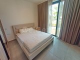 2 yatak odalı bahçe daire + tamamen mobilyalı + ortak havuzlar + spor salonu + sauna + yepyeni wellness merkezi + denize muhteşem manzaralar