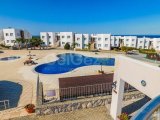 2 yatak odalı ikinci el çatı katı daire + full eşyalı + ortak havuzlar + kapılı güvenlik