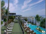 Modern stüdyo plan daireler + ortak havuzlar + kapalı ısıtmalı havuz + havuz barı + restoranlar + spa & sağlık merkezi + spor salonu + jeneratör + güvenlik ve C