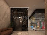 Modern stüdyo plan daireler + ortak havuzlar + kapalı ısıtmalı havuz + havuz barı + restoranlar + spa & sağlık merkezi + spor salonu + jeneratör + güvenlik ve C