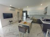 Deniz kıyısında gelişen 2 yatak odalı zemin kat daire + tamamen mobilyalı + ortak havuzlar + restoran + SPA merkezi + süpermarket + eczane + plaja yürüme mesafe