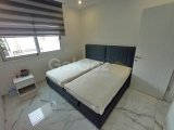 Deniz kıyısında gelişen 2 yatak odalı zemin kat daire + tamamen mobilyalı + ortak havuzlar + restoran + SPA merkezi + süpermarket + eczane + plaja yürüme mesafe