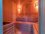 1 yatak odalı sahil gelişimindeki yeniden satış loft çatı katı daire + tamamen mobilyalı + ortak havuzlar + kapalı havuz + spor salonu + spa + restoran + süperm