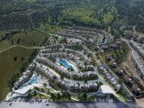 1 yatak odalı plan dışı LÜKS yeniden satış plaj kat bahçe daire + tamamen mobilyalı + 5 yıldızlı deniz kenarı gelişme + ortak yüzme havuzları + özel lagün'e