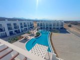 Yepyeni 1 yatak odalı ikinci el LOFT çatı katı daire + çatı terası + ortak yüzme havuzu + spor salonu + tüm olanaklara ve Akdeniz'e yakın