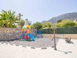 2 yatak odalı yeniden satış bahçe daire + tam eşyalı + ortak yüzme havuzu + çocuk oyun alanı + yeraltı otoparkı + tüm gerekli altyapı özelliklerine yakın konum