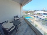 1 yatak odalı yeniden satılık tatil dairem + tamamen mobilyalı + ortak yüzme havuzları + çatı katı havuzu + spor salonu + kumsal + Pre 74 Türk tapu senedi