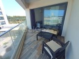 1 yatak odalı yeniden satılık tatil dairem + tamamen mobilyalı + ortak yüzme havuzları + çatı katı havuzu + spor salonu + kumsal + Pre 74 Türk tapu senedi