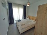 1 yatak odalı yeniden satılık tatil dairem + tamamen mobilyalı + ortak yüzme havuzları + çatı katı havuzu + spor salonu + kumsal + Pre 74 Türk tapu senedi