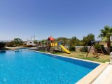 1 yatak odalı yeniden satılık tatil dairem + tamamen mobilyalı + ortak yüzme havuzları + çatı katı havuzu + spor salonu + kumsal + Pre 74 Türk tapu senedi