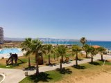 1 yatak odalı yeniden satılık tatil dairem + tamamen mobilyalı + ortak yüzme havuzları + çatı katı havuzu + spor salonu + kumsal + Pre 74 Türk tapu senedi