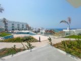 Lüks yeniden satış stüdyo daire + ortak havuzlar + restoran + spor salonu + spa + plaja erişim + muhteşem deniz ve dağ manzaraları