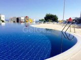Güzel 2 yatak odalı bahçe dairesi + 2 ortak havuz + fitness merkezi + sauna + site içi restoran-kafe
