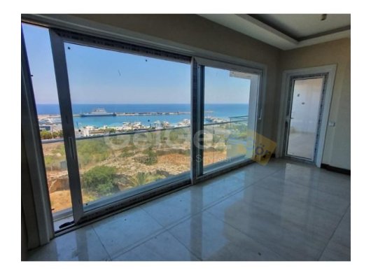 GİRNE MERKEZDE DENİZE SIFIR 3+1 SATILIK DAİRE