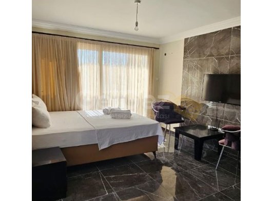 TAKSİT İMKANI!!!İSKELE LONG BEACH SATILIK EŞYALI 1+0 STUDIO