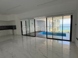 GİRNE’DE MODERN 3+1 DAİRE DENİZ MANZARALI DAİREYE ÖZEL HAVUZLU BALKON