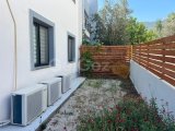 GİRNE ALSANCAK'TA GENİŞ BAHÇE KULLANIMLI 2 YATAK ODALI SATILIK DAİRE