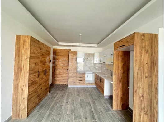 GİRNE BOĞAZ BÖLGESİNDE SATILIK TÜRK KOÇANLI SIFIR 2+1 BAHÇELİ DAİRE