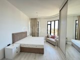 Girne merkezde havuzlu site içerisinde lüks eşyalı 2+1 daire