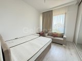 Girne merkezde havuzlu site içerisinde lüks eşyalı 2+1 daire