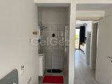 Kiralık Modern 1+1 Daire – Palmiye Körfezi Manzarası, Bahçeli