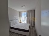 Girne merkezde karmarket civarı havuzlu rezidansta kiralık full eşyalı 2+1 daire