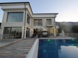 KIBRISIN EN GOZDE BOLGELERINDEN BELLAPAISTE MUHTESEM DAG VE DENIZ MANZARALI 938m2 HAVUZLU VILLA
