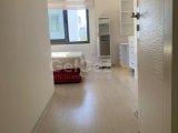 Girne zeytinlik bölgesinde full eşyalı geniş teraslı satılık 2 + 1 daire