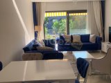 Girne zeytinlik bölgesinde full eşyalı geniş teraslı satılık 2 + 1 daire