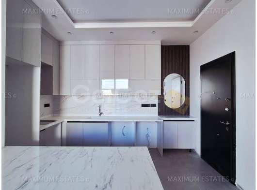 Lapta’da Geniş Teraslı ve Panoramik Manzaralı Modern 2+1 Daire