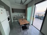 Girne Merkez'de Deniz ve Dağ Manzaralı Geniş Balkonlu Kiralık Eşyalı 3+1 Penthouse