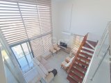 GİRNE ALSANCAK' TA , VİLLA TADINDA, HAVUZLU SİTE İCİNDE, DENİZ MANZARALI SATILIK 3+1 KATTA LOFT DAİRE